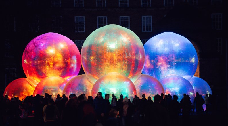 A photo of giant, inflatable bubbles.