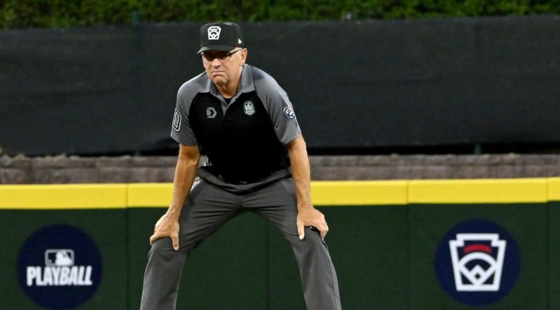 Chief Shelton umpiring.