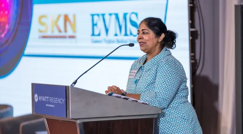 Dr. Dodani at lectern