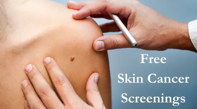 doctor looking at mole