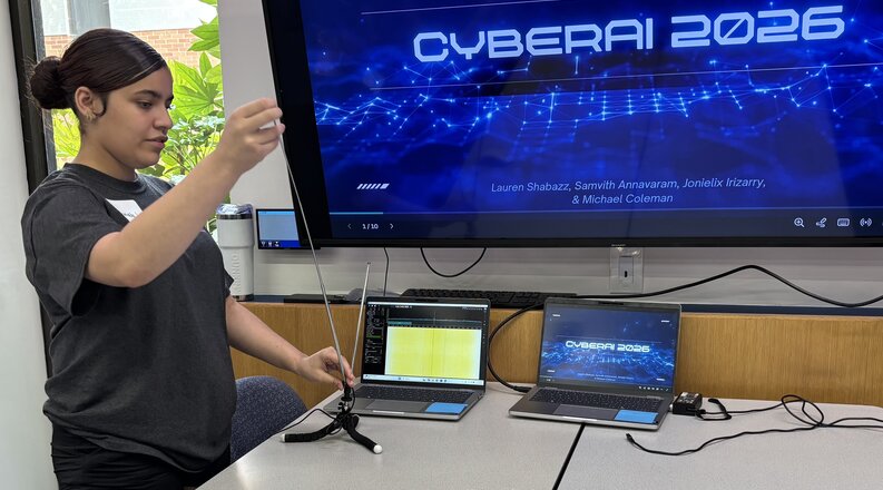 Student adjusts antennae