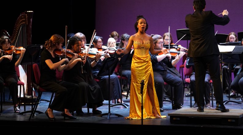 Kristiana Jones performs on a stage.