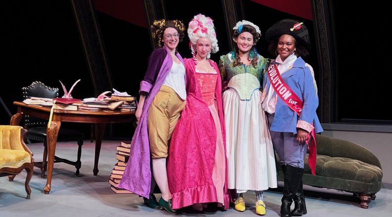 Four actors standing together