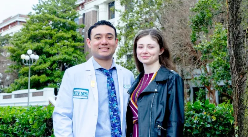 Phavon Sage and his wife Megan Sage outside their alma mater