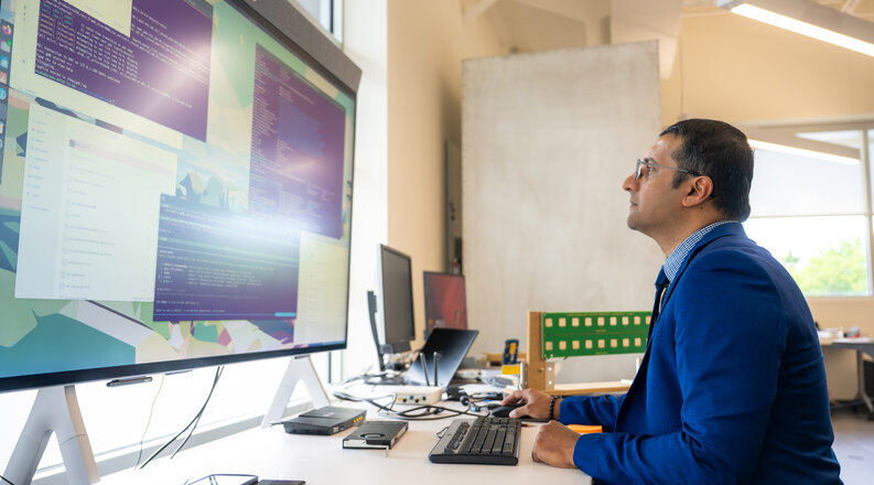 Sachin Shetty at a computer