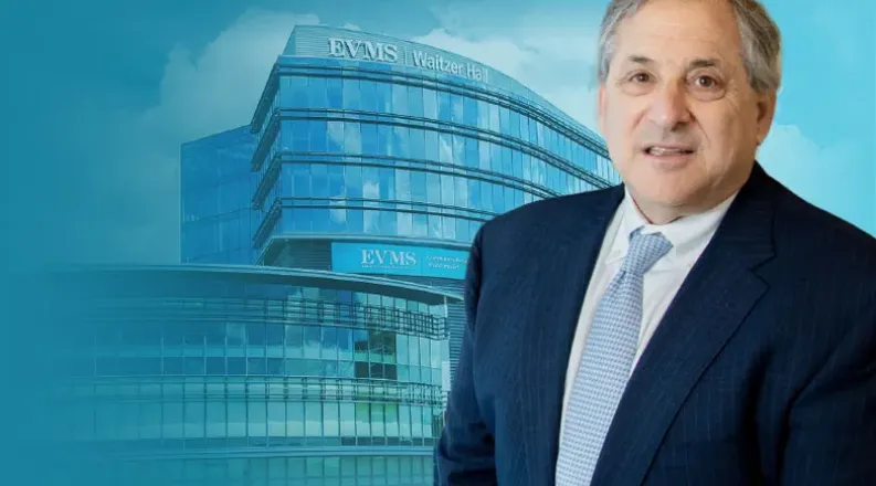 Waitzer in front of Waitzer Hall