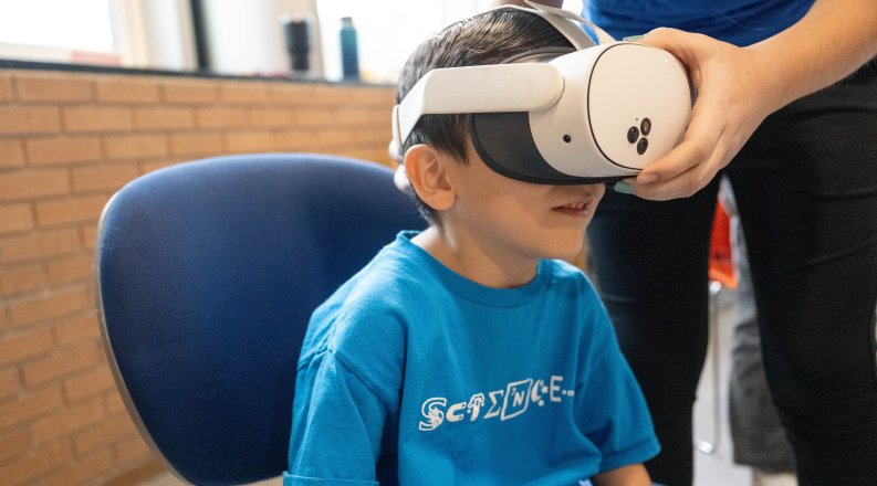 Young Student wears VR headset