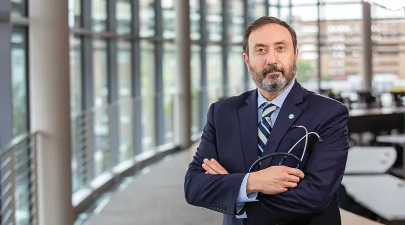 Dr. Abuhamad standing in Waitzer Hall.