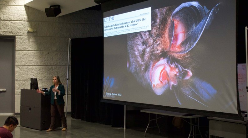 Dr. Jonna Mazet giving lecture in the CAVE. 