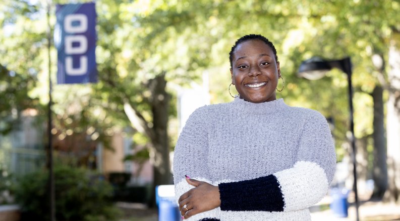 Chiamaka Abjumaki standing on campus