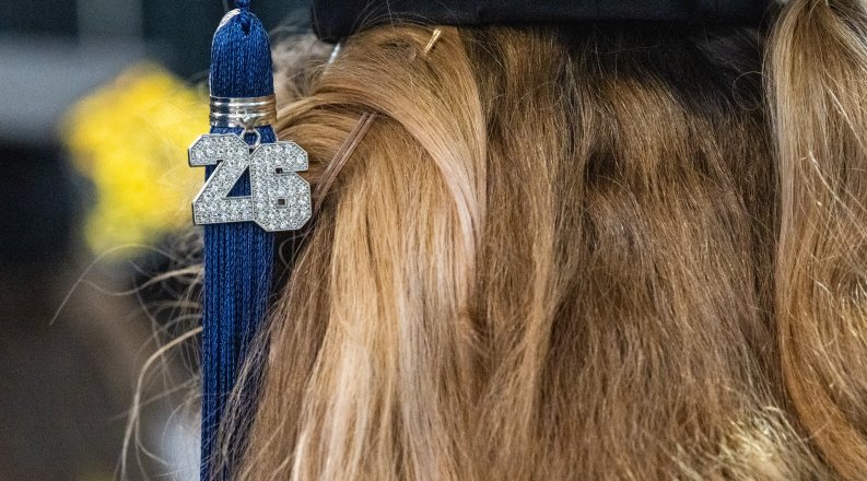 Graduation tassel that reads "26"