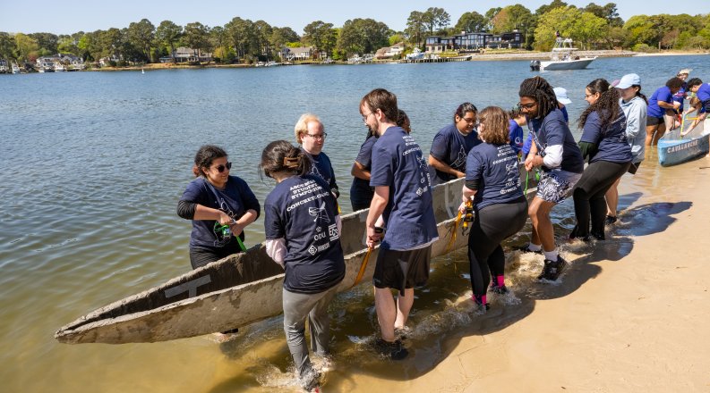 Team pulls concrete canoe to the water