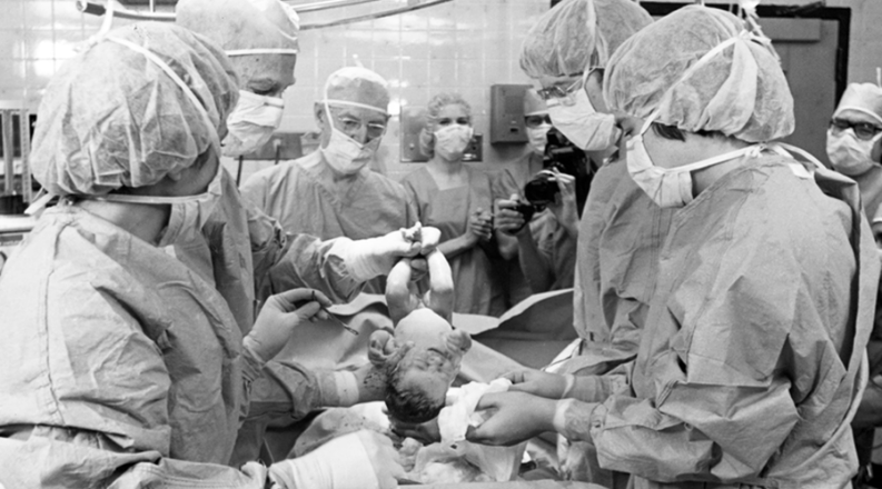 Doctors working on the first IVF