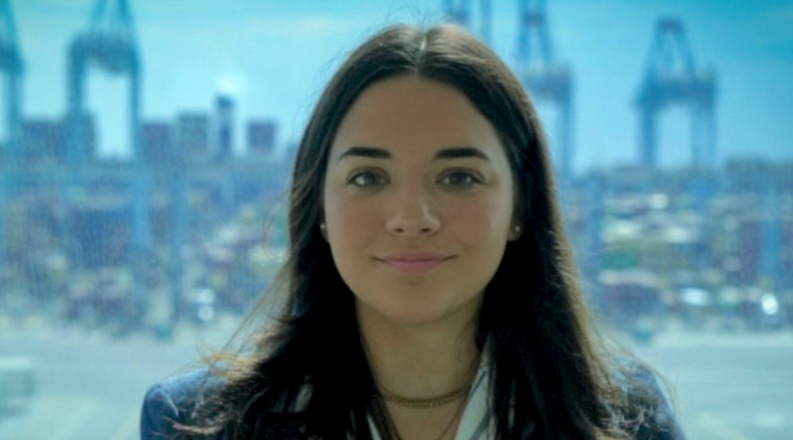 Libby Guindon poses near a cargo terminal in Hampton Roads.
