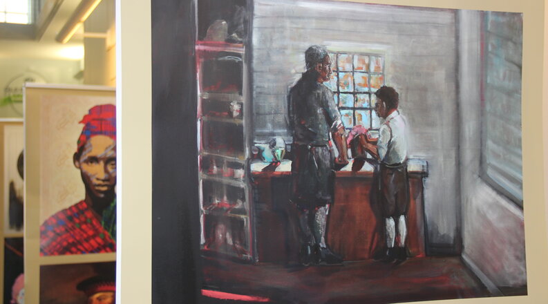 a gallery of paintings in the perry library