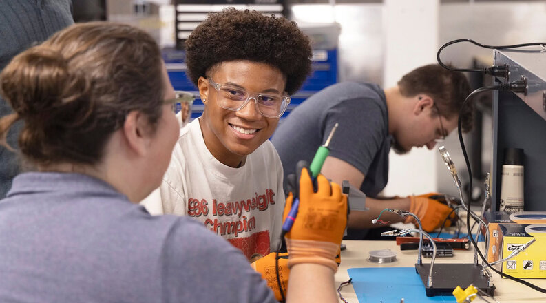 MAP2E students work together on a hands-on water-filtration engineering project at Old Dominion University.