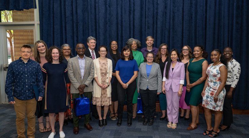 A group of students and faculty members pose for a photo at the 2023 Diversity Champion and Pathway Retention Awards. 
