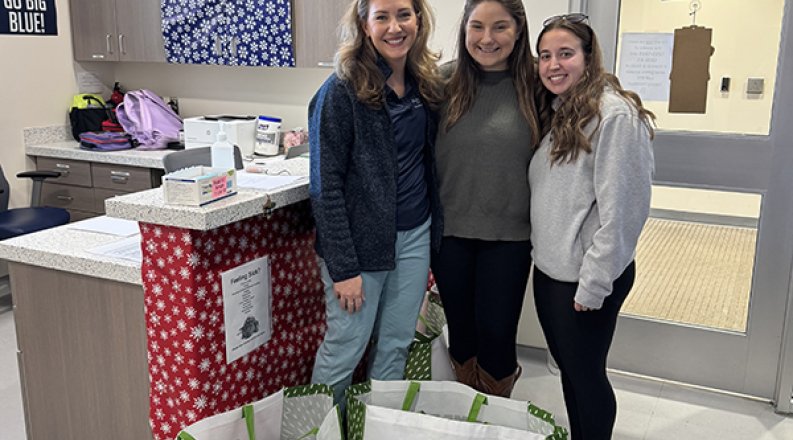 Physical threapy students with supplies 