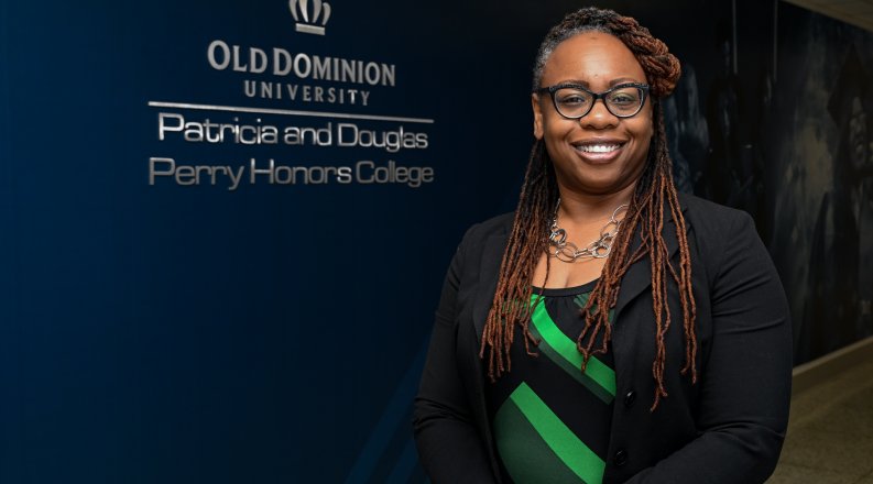women stands next to interior signage 