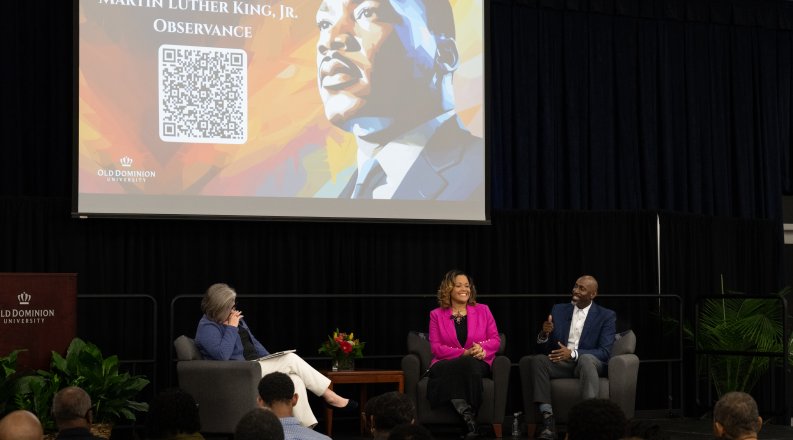 Master of Ceremonies Cathy Lewis (left) shares a light moment with keynote speakers Dwight S. Riddick II, Ph.D., and Jennell Whitfield Riddick, Ph.D., at Old Dominion University’s 41st Annual Martin Luther King Jr. Observance on January 29.