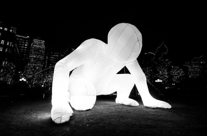 Photo of a giant inflatable human. 