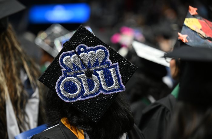 A photo of a graduation cap that reads "ODU."