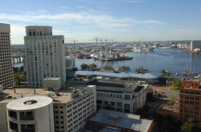 Photo of buildings overlooking the water.