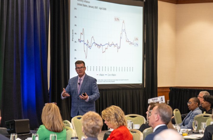Bob McNab presenting at the midyear economic forecast