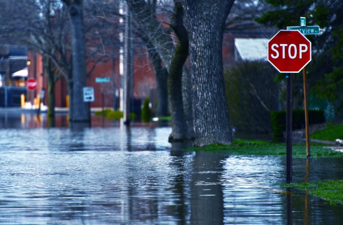 A street in Norfolk is flooded with water.