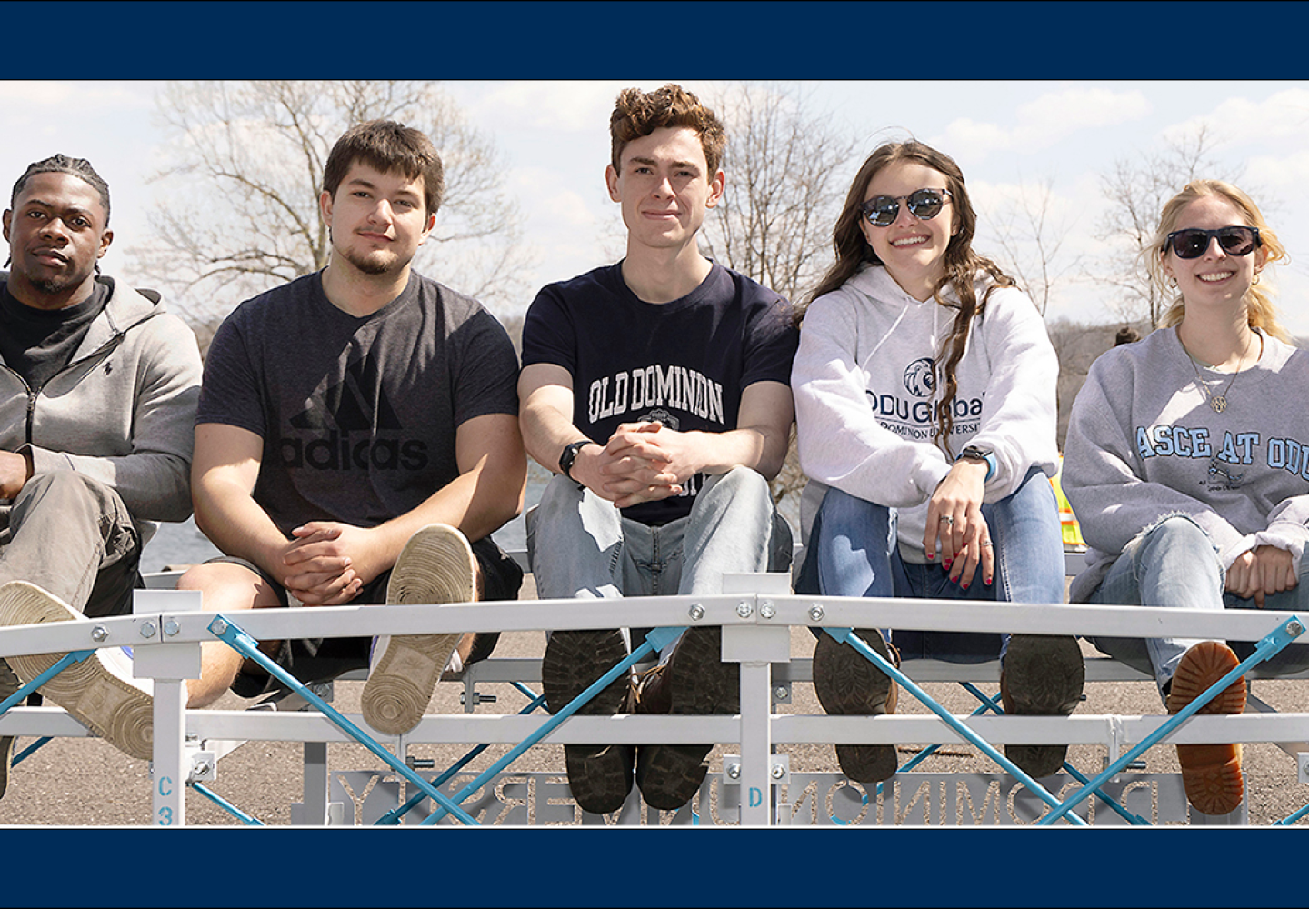 students sit on a bench