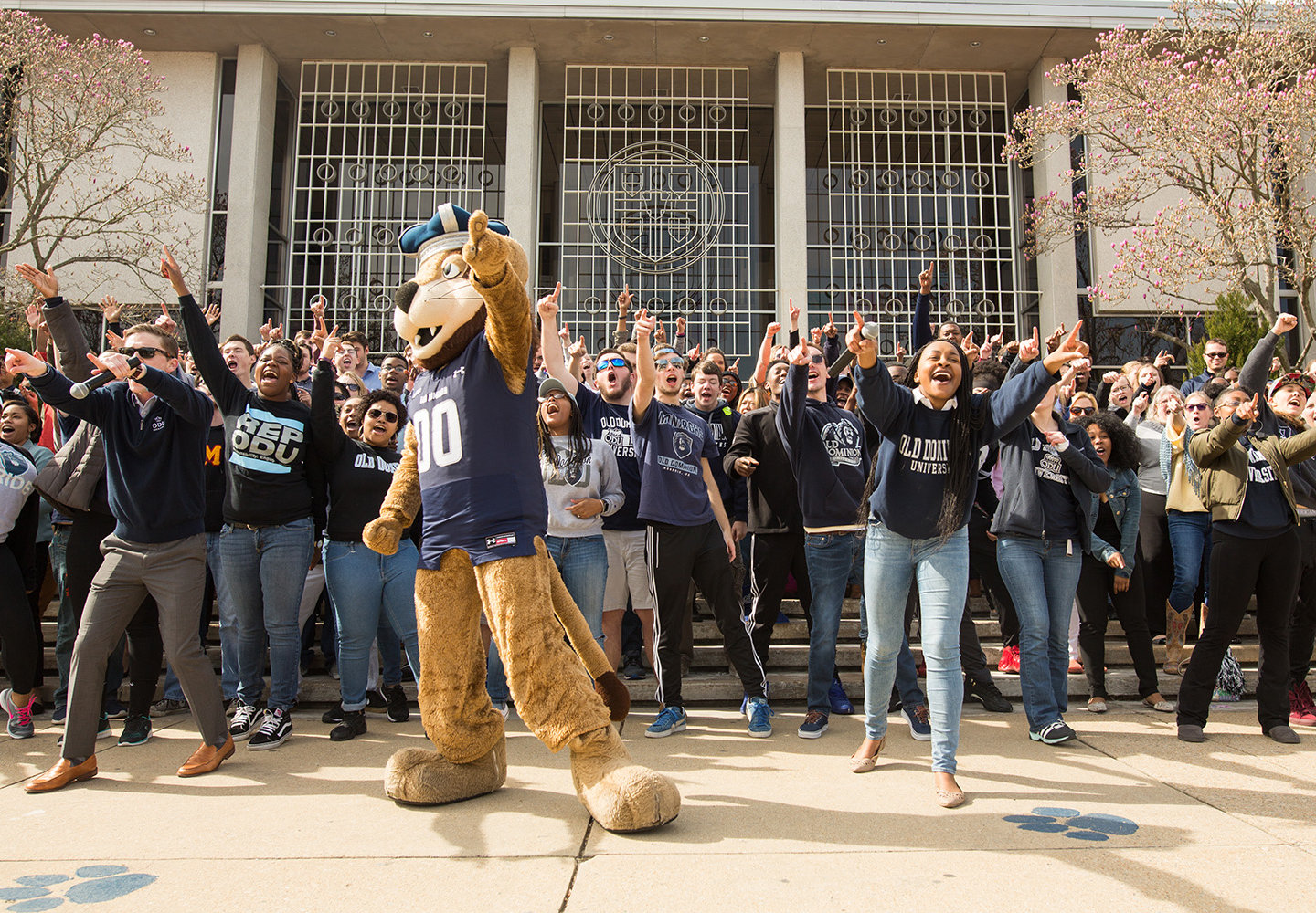 ODU students cheering with Big Blue mascot