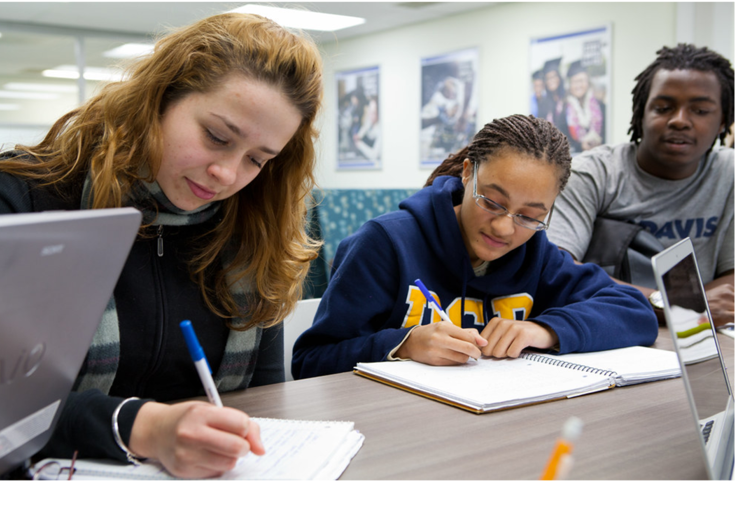 3 students write and study in the STC