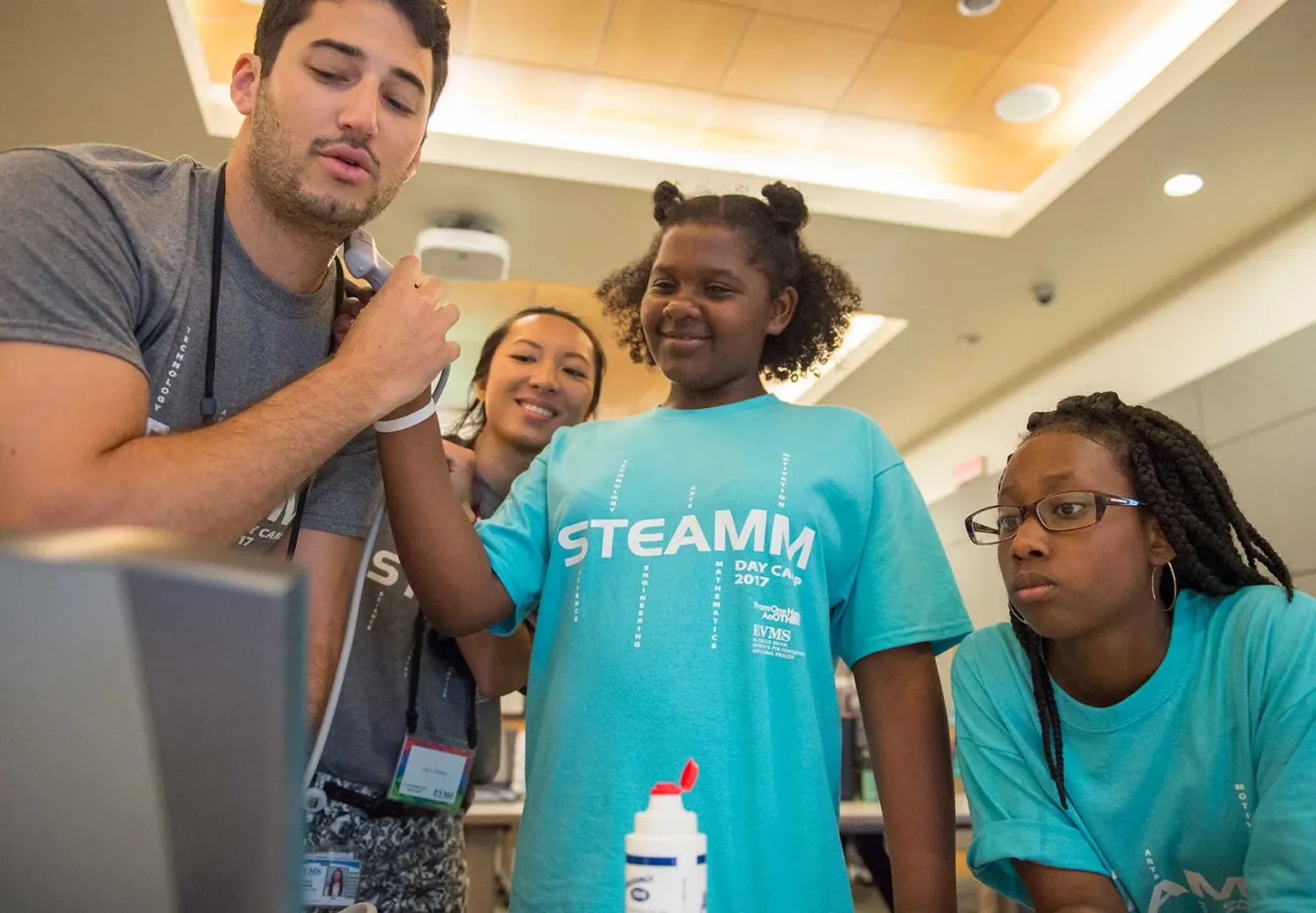 Students demonstrate the portable ultrasound.