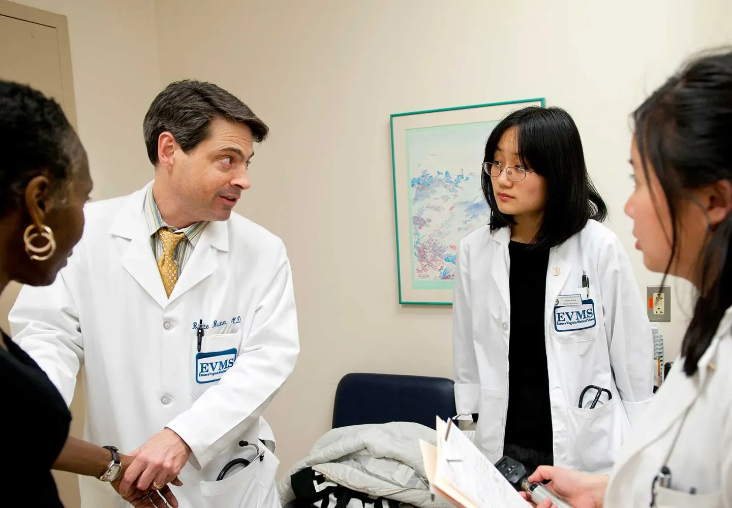 Dr. Bruce Britton demonstrates patient care techniques to st