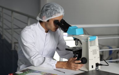 Student at Microscope