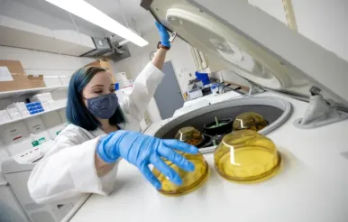 Female student working in a lab