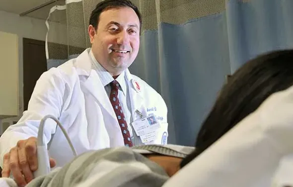 Dr. Alfred Abuhamad performs an ultrasound.
