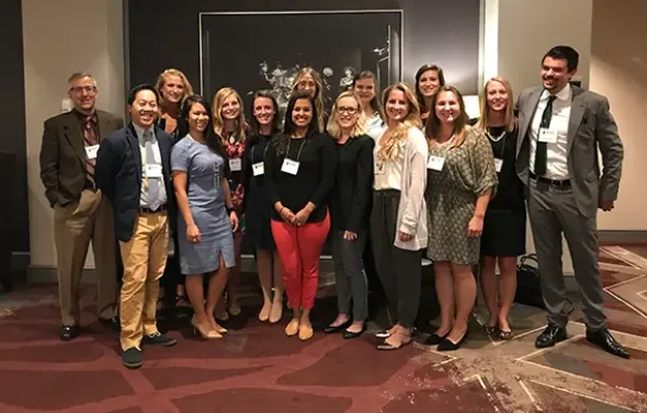 OB-GYN residents gather at an event.
