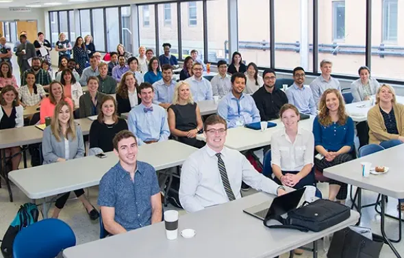 Summer Scholars pose for a group photo in the classroom.