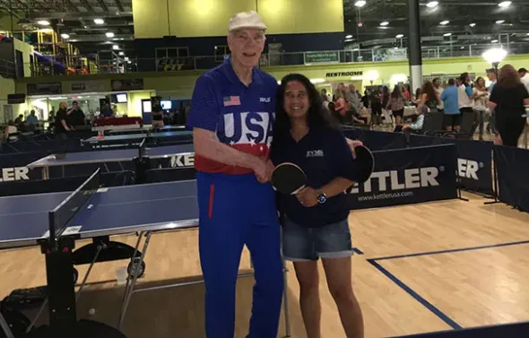 Table tennis hall-of-fame inductee Dean Johnson and Dr. Mari