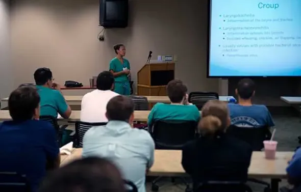 An Emergency Medicine resident presents research.