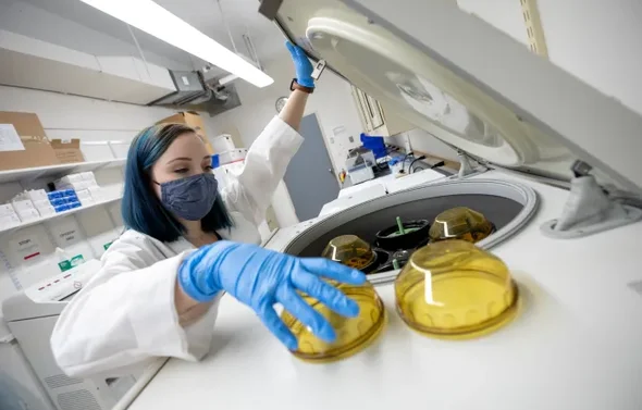 Female student working in a lab