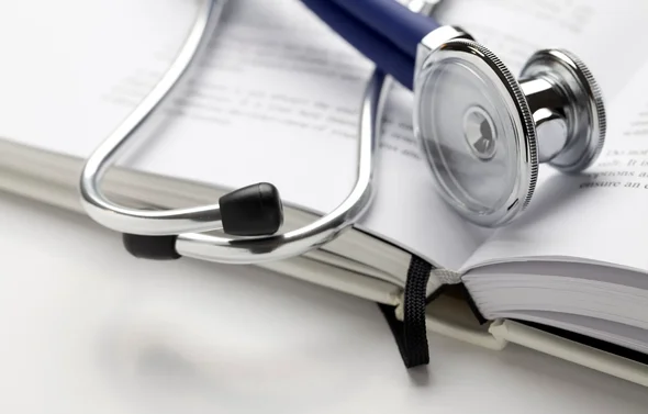 Stethoscope on book