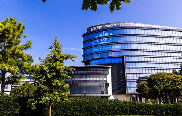 Waitzer hall is a multi-story building with mirrored walls a