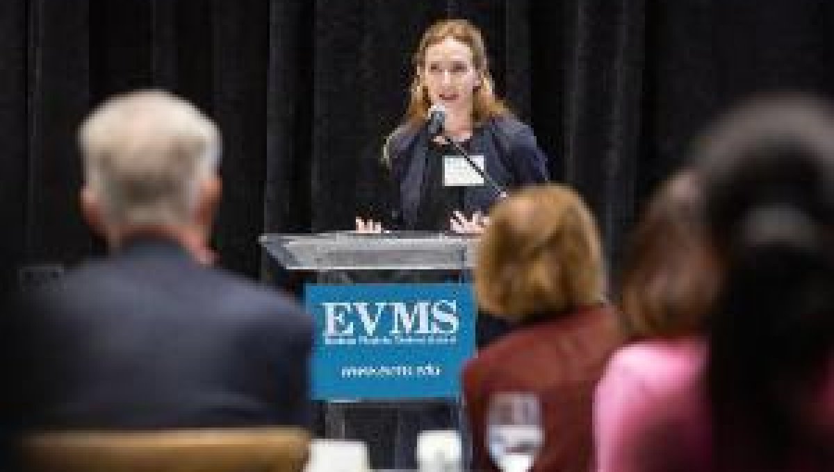 Lindsay Robbins MD gives a welcome to the guests at CMCHEA's