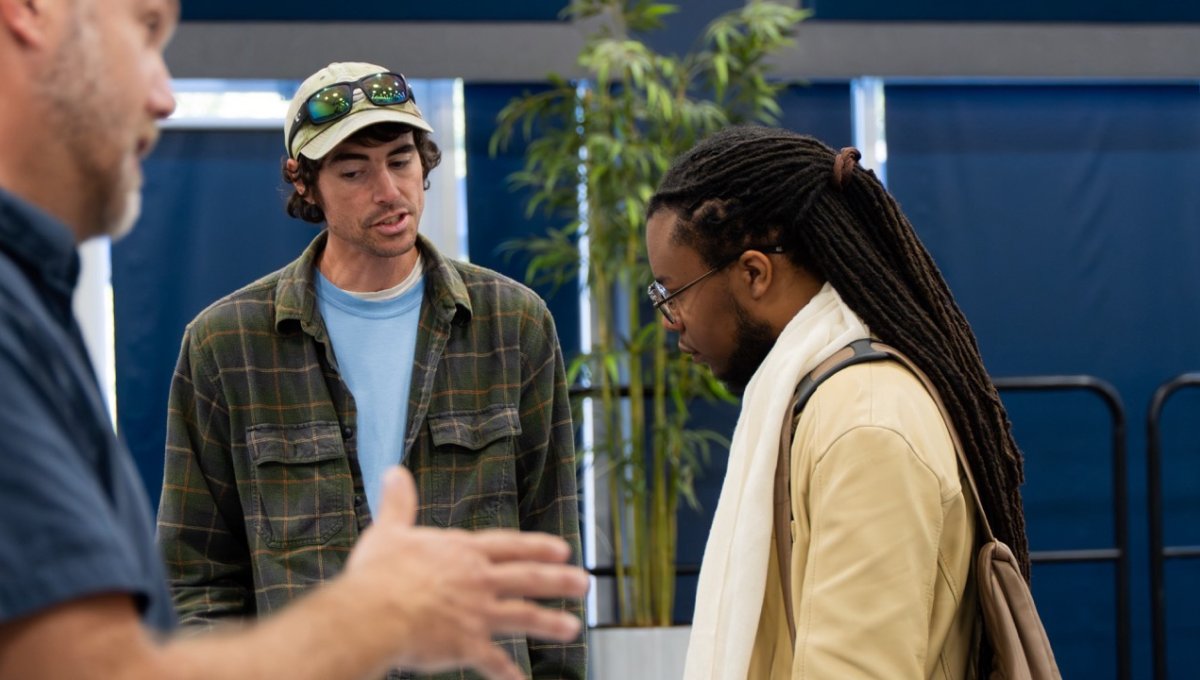 Nick Flander Manager of Blackwater Ecological Preserve talks to student