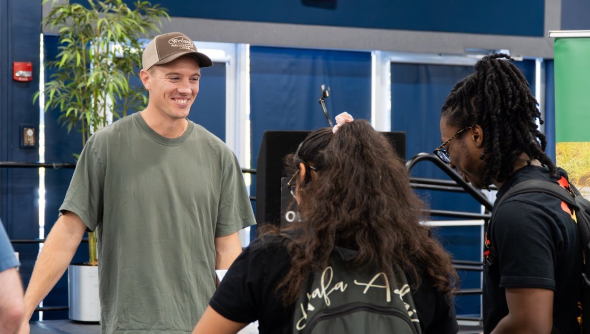Nikolai Karlov from Wetlands Studies & Solutions talks to students