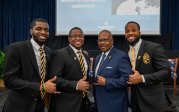 Hugo Owens Jr. poses with fellow members of Alpha Phi Alpha Fraternity.