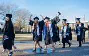A group of students walk on ODU's campus.
