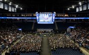 Photo of ODU students and their families gathered in a basketball arena for commencement.